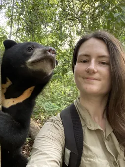 Kristen taking a selfie with a sunbear