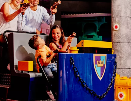 Families playing games at the LEGOLAND Discovery Center