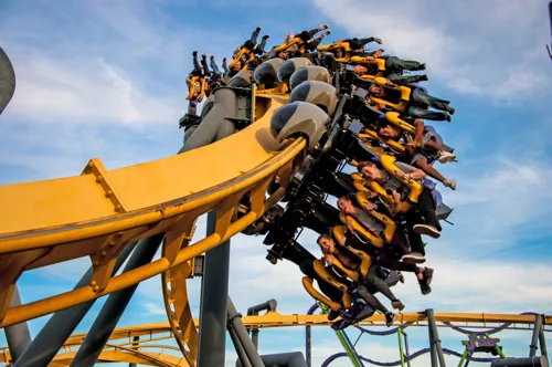 Visitors riding Batman roller coaster at six flags