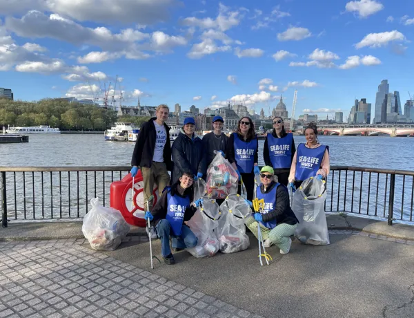 SEA LIFE London Staff posing during a SEA LIFE TRUST Beach Clean up.