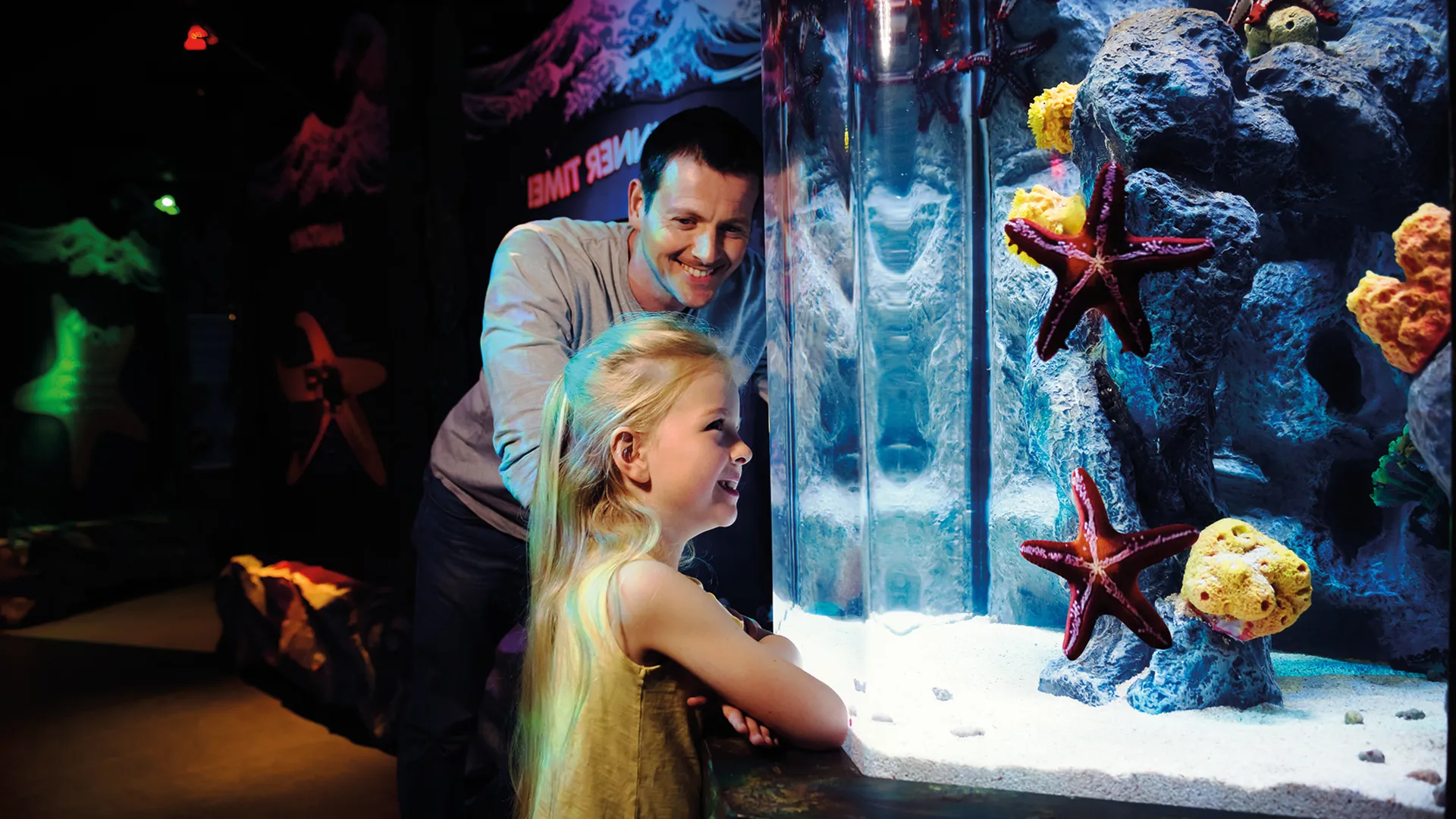 Dad and daughter at the aquarium