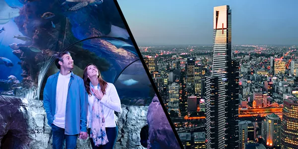 man and woman walking through sea life split with image of city sky tower