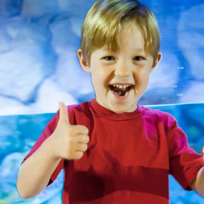 Kid Smiling Thumbs Up