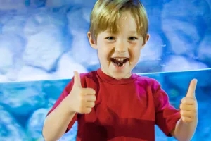 Kid Smiling Thumbs Up