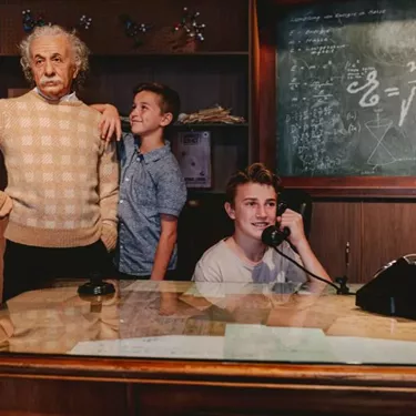 Guests Interacting With Einstein