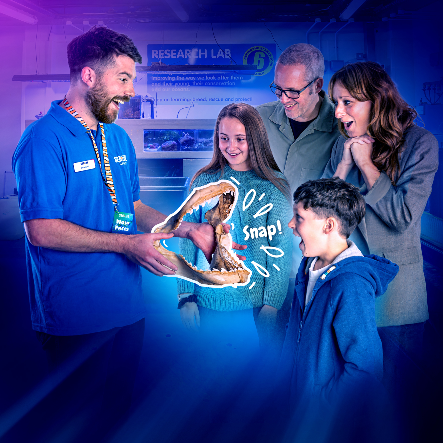 Family looking at a shark skull on the behind the scenes tour at SEA LIFE Weymouth